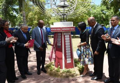 Photo Caption: Prime Minister Dr. Keith Rowley unveils the commemorative plaque in his honour during the Induction Ceremony at Prime Minister’s Park. Looking on are (from left) Mikaela Gonzales, President, UWI Mona Campus Guild of Students; Professor Archibald Mc Donald Pro Vice Chancellor and Principal, UWI, Mona Campus; Mrs Sharon Clarke Rowley, Professor Sir Hilary Beckles, Vice-Chancellor of UWI and Senator Dennis Moses, Minister of Foreign and CARICOM Affairs of Trinidad and Tobago.