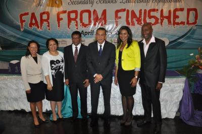 Caption: President Anthony Thomas Aquinas Carmona (3rd from right) poses for a photo opportunity at the event. He is joined by (from left): Permanent Secretary, Ministry of Sport and Youth Affairs, Natasha Barrow; Director of Communications and Stakeholder Relations, FLOW, Trudy De Verteuil; Chairman, the Sports Desk, Valentino Singh; CNC3 News Presenter, Golda Lee Bruce; and Motivational Speaker, Don La Foucade. (Photo courtesy the Ministry of Sport and Youth Affairs)