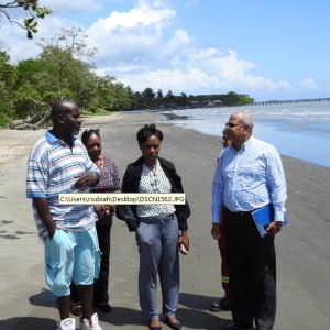 Ms Penelope Bradshaw-Niles, Permanent Secretary(Ag) - Ministry of Energy and Energy Industries (Centre), Mr Alvin La Borde-President of the La Brea Fisherfolk Association (1st from L) and officials from the Ministry of Energy and Energy Industries and Petrotrin at the Carat Shed Beach Facility during a walkabout to view possible areas affected by the leaking well in the Gulf of Paria