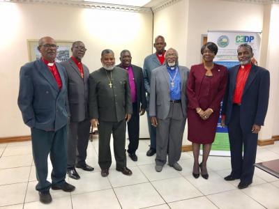 Photo Caption: (L-R) His Grace Archbishop Frank Garraway; Bishop Phillip Placide; Bishop Ray M.S. Brathwaite; Bishop Patrick Roberts; Bishop Carlye Elie; His Eminence Patriarch Stephen Julien; Councillor Dr. Agatha Carrington, Secretary of Health, Wellness and Family Development; Bishop Roger Lewis. (Photo Courtesy:
