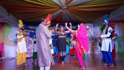 Caption: Minister of Community Development, Culture and the Arts, Dr. the Honourable Nyan Gadsby- Dolly (centre) performs the Bhangra with the Asian Punjabi Folk Dance Club to the delight of Acting High Commissioner of India, Shri Amar Jeet at the Divali Nagar in Chaguanas on December 3, 2016. (Photo courtesy the Ministry of Community Development, Culture and the Arts)