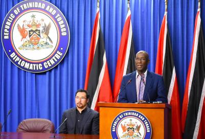 Caption: Prime Minister of the Republic of Trinidad and Tobago, Dr. the Honourable Keith Christopher Rowley addresses the media during yesterday's media conference at the Diplomatic Centre in St. Ann's. Also in the photo is the Minister of State in the Office of the Prime Minister and Ministry of the Attorney General and Legal Affairs, the Honourable Stuart Young. (Photo courtesy the Office of the Prime Minister)