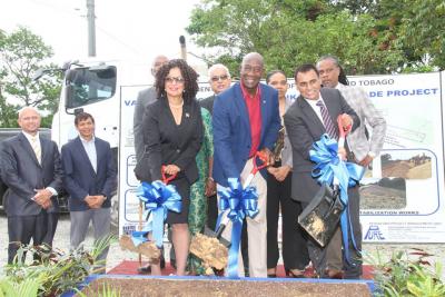 Prime Minister Dr the Honourable Keith Rowley, centre, Parliamentary Secretary in the Ministry of National Security and Member of Parliament for Toco/Sangre Grande the Honourable Glenda Jennings-Smith left, and Senator the Honourable Rohan Sinanan, Minister of Works and Transport, right, turn the sod to signal the start of the upgrade works of the Valencia to Toco Road.