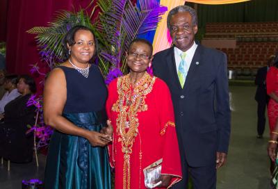 Caption: Veteran Calypsonian, McArtha 'Calypso Rose' Sandy-Lewis (c) poses for a photo with THA Chief Secretary, Orville London (right) and his wife, Mrs. Brigid London. Calypso Rose was one of three recipients of the Tobago Medal of Honour, Gold at the Tobago Day Awards held on December 4. (Photo courtesy the Tobago House of Assembly)