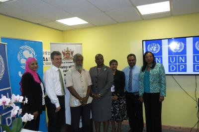 Talking Poverty: (L-R) Sharifa Ali-Abdullah, Assistant Resident Representative, UNDP Trinidad and Tobago, Aruba, Curacao, St Maarten, Richard Blewitt, UN Resident Representative, UNDP Trinidad and Tobago, Aruba, Curacao, St Maarten, Professor Karl Theodore, Minister of Social Development and Family Services, the Hon. Cherrie Ann Crichlow-Cockburn, and Permanent Secretaries Joanne Deoraj, Ian Ramdahin and Jacinta Bailey-Sobers.