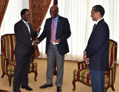 Caption: Prime Minister of the Republic of Trinidad and Tobago, Dr. the Honourable Keith Rowley (c) greets Prime Minister of Grenada, Dr. the Right Honourable Keith Mitchell during a courtesy call in October 2015. Looking on is Minister of Foreign Affairs, Senator the Honourable Dennis Moses. (Photo courtesy Office of the Prime Minister)