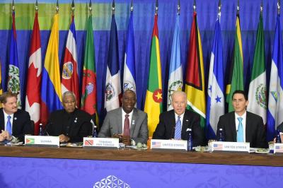Caption: Prime Minister Rowley addresses delegates at the US-Caribbean-Central American Energy Summit in Washington D.C on May 4. He is flanked by the President of Guyana, David Granger (2nd from left) and US Vice-President, Joe Biden ( 2nd from right). (Photo courtesy facebook.com/The-Office-of-the-Prime-Minister-of-Trinidad-and-Tobago)