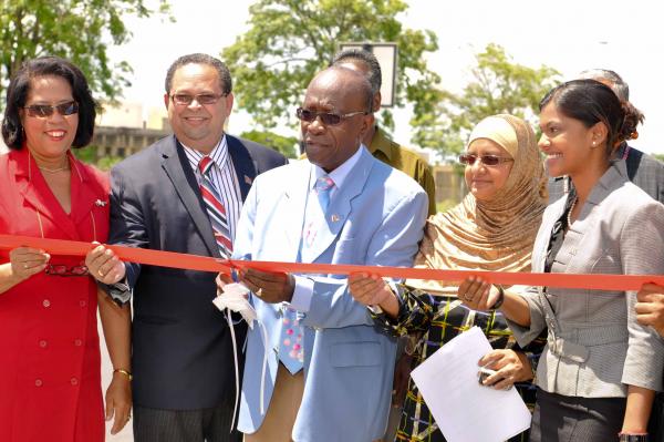 Minister Jack Warner cuts the ribbon to officially open the third of the Uriah Butler Highway, Mount Hope. Others in photos are from left Cheryl Blackman, Permanent Secretary, Ministry of Works and Infrastructure; Herbert Volney, Member of Parliament for St Joseph, Nafeesa Mohammed, Chairman, San Juan Laventille Regional Corporation and Stacy Roopnarine, Minister in the Ministry of Works and Infrastructure Minister Jack Warner cuts the ribbon to officially open the third of the Uriah Butler Highway, Mount Hope. Others in photos are from left Cheryl Blackman, Permanent Secretary, Ministry of Works and Infrastructure; Herbert Volney, Member of Parliament for St Joseph, Nafeesa Mohammed, Chairman, San Juan Laventille Regional Corporation and Stacy Roopnarine, Minister in the Ministry of Works and Infrastructure