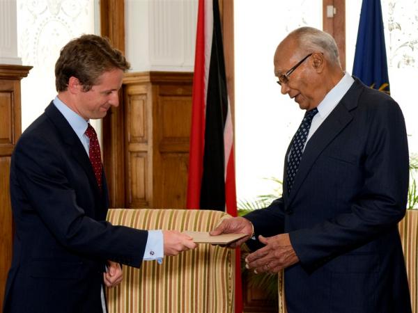 President George Maxwell Richards receives the credentials from British High Commissioner to Trinidad and Tobago H.E. Arthur Snell. President George Maxwell Richards receives the credentials from British High Commissioner to Trinidad and Tobago H.E. Arthur Snell.